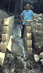 Making horizontal infiltration galley walls with concrete block.